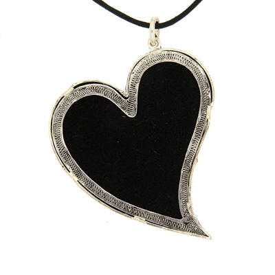 Silver heart pendant with red brocade