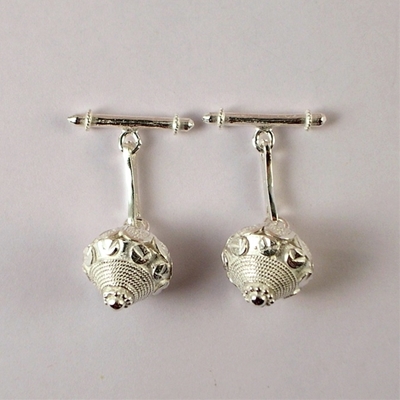 Silver cufflink with Sardinian botton